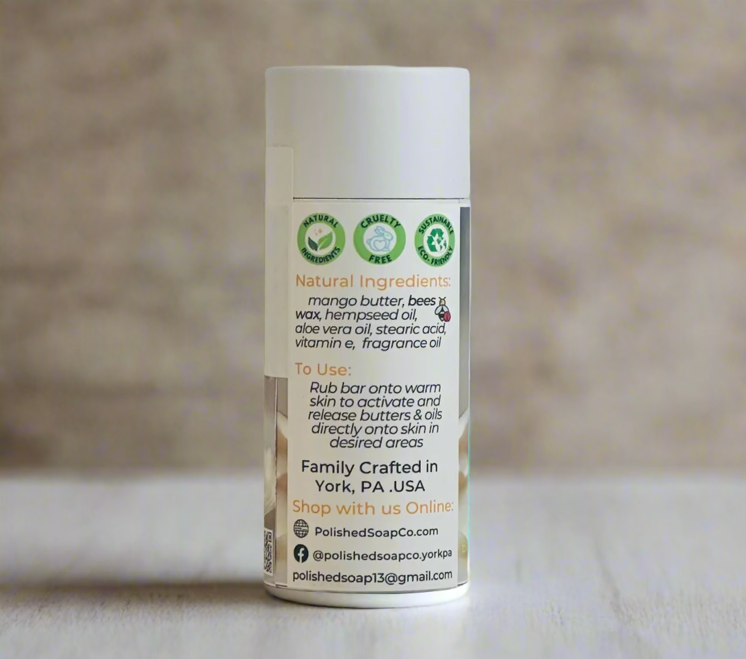 Tube of soap with natural ingredients label on a light wooden surface