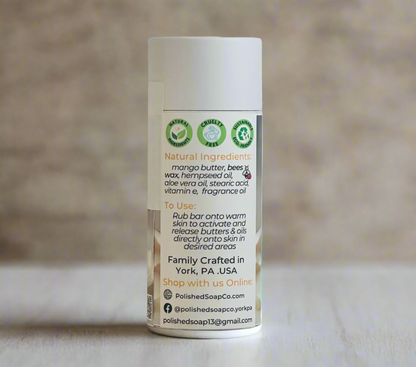 Tube of soap with natural ingredients label on a light wooden surface